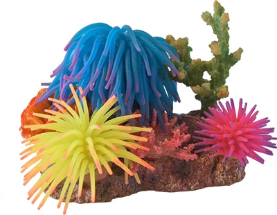 3 SILICONENBLOEMEN MET ROTS EN SCHELP 15 CM